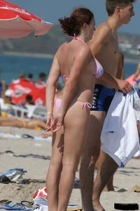 Beach voyeur girls in bikinis, thongs and topless