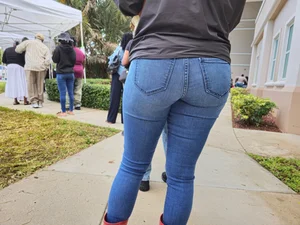 Ebony in jeans  in the voting line