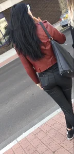 Chav brunette with a nice ass and vpl in tight black leather pants