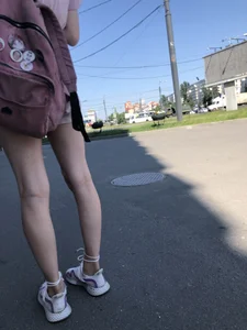 Cute Skinny Candid Girl in Shorts and Sneakers Street Photos