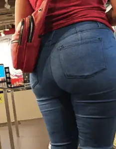 Thick ebony booty in tight jeans.