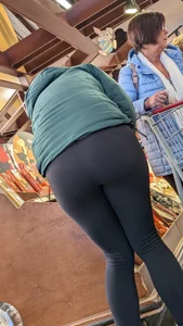 Tight legs and ass in black legging. Bend over