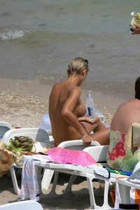 Beach voyeur babes in bikinis, thongs and topless