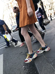 Cute Teen Girl in a Dress With Slim Legs Standing in the Subway Train, Then Crossing the Street Photo Gallery