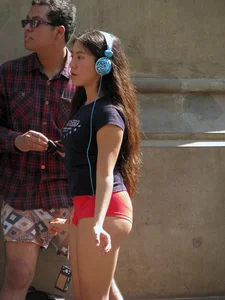 Girl in Red Mini Shorts on the City Street Creepshot