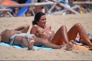 Girls on a nude beach in Bibione, Italy
