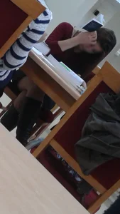 Candid Girl in Pantyhose And Boots Working at the Desk in a Public Library Creepshots Gallery
