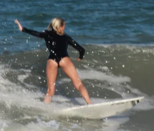 Hot surfer chicks out in the water