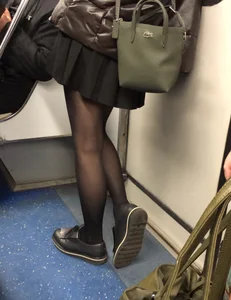 Sexy candid legs in black pantyhose subway train creepshot