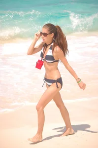 Bunch of sexy girls and milfs in bikinis at the beach