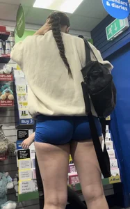Stunning cheeked up gym girl shopping in blue shorts (OC)