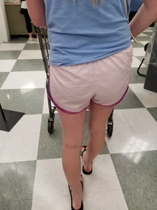 Nice blonde ass in athletic shorts while shopping
