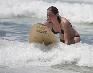 Candid surfer babes on the beach and in bikinis
