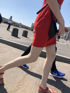 Girl in a Red Dress and Sandals With Thin, Pale Legs on the Crosswalk City Creepshots Gallery