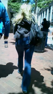 Blonde in tight jeans with her red thong sticking out