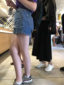 Hot Bare Legs in Blue Denim Shorts Closeup Candid Pics Gallery in the Cafe Line