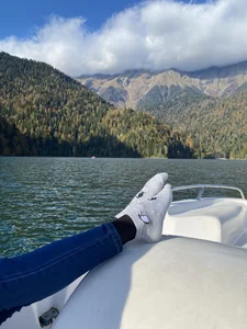 Skinny Teen Legs in Jeans And Feet - Taking Off Sneakers And Showing Socks