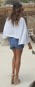 Flat ass leggy girl in denim shorts