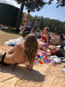 Gorgeous Candid Girl With a Large Tattoo on Her Butt Lying on the Beach Creepshot