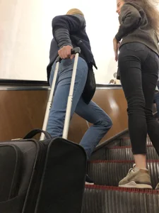Girl with Thin Legs and Very Nice Flat Booty in Black Jeans at the Subway Escalator Creepshots