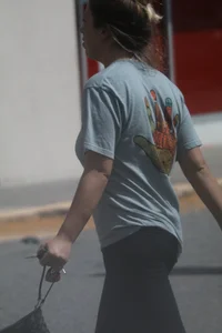 Girl going to TJ Maxx walking in the parking lot in leggings