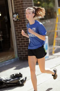 Candid track girls and runners