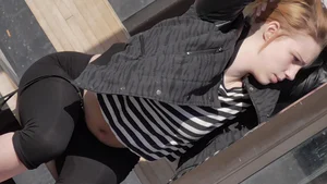 Strawberry blonde cutie showing stomach and in leggings