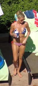 Blonde babe at the pool with sexy body in USA bikini