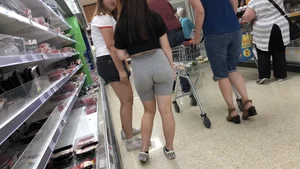 Cute brunette shopping with a nice ass in tight grey shorts with a wedgie