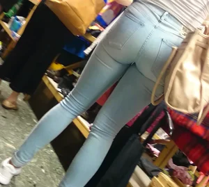 Girl shopping in light colored tight jeans with a nice ass