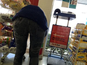 Sexy blonde with a nice ass in tight patterned jeans