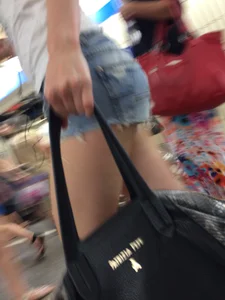 Girl with Hot Muscular Legs in Shorts - Subway Creephot