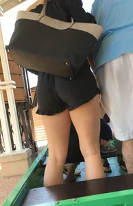 Blonde bending over in black shorts with vtl