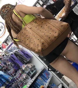 Hoodrat in leather booty shorts