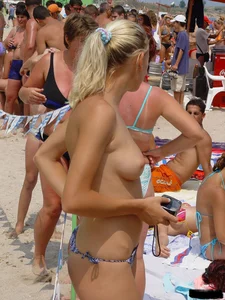 Beach voyeur girls in bikinis, thongs and topless