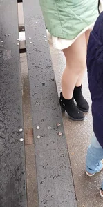 Closeups of a candid girl's legs on the street, high heels