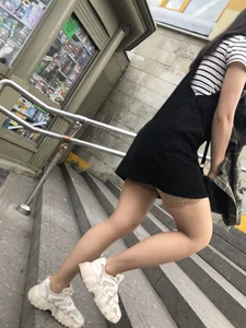 Candid girl in a short dress and stockings, awesome legs