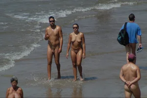 Girls on a nude beach in Sitges, Spain