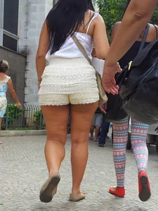 Big ass in shorts and ebony friend in leggings