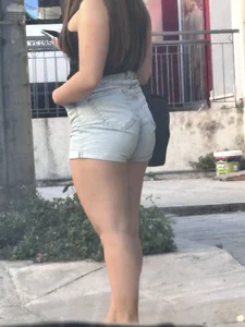 Short pawg waiting for bus (slight of side boob)
