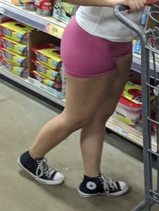 Cute latina in tight pink shorts