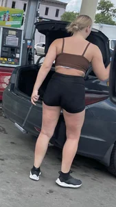 At the gas pump with a fat rump