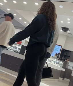 Curly haired babe in alphalete leggings
