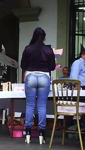 Big booty Latina lady in tight jeans with a round ass