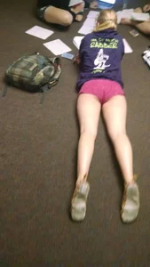 Candid Girl in Mini Shorts Lying on the Floor