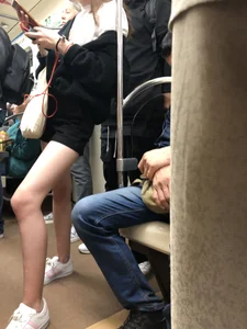 Girl in Shorts with Hot Skinny Legs in a Subway Train Candid