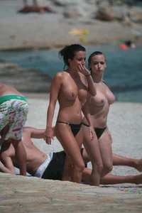 3 amazing topless girls on a nudist beach