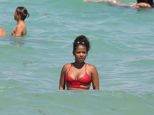 Christina Milian in red bikini in Miami with hard nipples