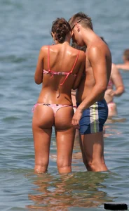 A bunch of sexy beach voyeur babes in bikinis, thongs and topless