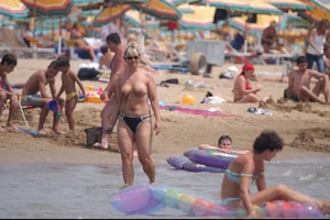 Girls on a nude beach in Bibione, Italy